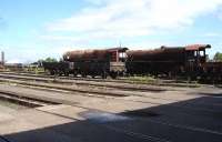 The rusting and tenderless 9F 92245 together with Black 5 44901 standing in the south east corner of the yard at the former 88C Barry steam shed. This is now run by Cambrian Transport as the base for the Vale of Glamorgan Steam Railway. In 2013 the two locos were somewhat crudely dismantled to remove boiler and cab from the frames. Some parts were to be used for other rebuild projects. <br><br>[David Pesterfield 30/08/2012]