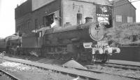 4079 <I>Pendennis Castle</I> standing alongside the coaling stage at Laira shed, Plymouth, in June 1961. Withdrawn by BR in 1964 the locomotive was preserved and, following a number of years in Australia, is currently (mid 2012) undergoing major overhaul at the Great Western Society, Didcot. [See image 23535] <br><br>[K A Gray /06/1961]