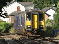 A 153/156 combination heading south to Manchester Victoria on 29 August 2012, having passed the site of the old Wilpshire station and now approaching the present day Ramsgreave & Wilpshire.<br><br>[John McIntyre 29/08/2012]