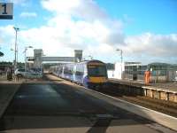 A southbound departure from platform 1 at Montrose on 28 August about to pass below the station's new footbridge, complete with integral passenger lifts.<br><br>[John Yellowlees 28/08/2012]