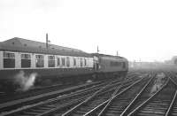 The <I>'Thames-Clyde Express'</I> leaves Carlisle for St Pancras on 17 December 1968. The locomotive is Holbeck 'Peak' type 4 no 17, signalled for the S&C route home to Leeds. <br><br>[K A Gray 17/12/1968]