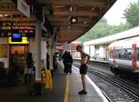 Man in Bikini. The Waterloo bound platform at Richmond, on a July afternoon in July 2005.<br><br>[John Furnevel 22/07/2005]