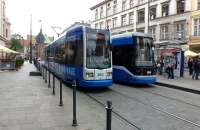 Coming (fairly) soon to a city near you - modern trams passing near Grodska Street, Krakow, on 18 July 2012. Of course, the city fathers in Krakow had the good sense to keep their tram system, unlike so many British cities. The trams are Bombardier NGT6 built in 2003.<br><br>[Colin Miller 18/07/2012]