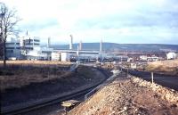 The newly completed freight sidings and British Aluminium smelter at Invergordon in 1971. At its peak the smelter generated traffic for three trains daily, bringing in butane and taking out aluminium blocks, plus alumina for the Fort William smelter - won by rail despite requiring a 330-mile haul compared to the direct road distance of less than 100 miles!<br><br>[Frank Spaven Collection (Courtesy David Spaven) //1971]