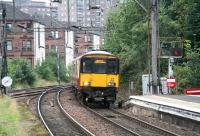 West end of Dalmuir station on 9 September 2012. The train pulling into platform 4 is the Sunday 14.41 Balloch - Partick.<br><br>[John Furnevel /09/2012]