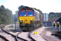 The first train out of Earlseat Loading Point on the Methil branch ran on 22 August 2012. There are now two trains a week, on Tuesday and Thursday, to Hunterston. 66140 leaves the site on 11 September, with the former 'main line' to Methil (now used for loco release) to the left.<br><br>[Bill Roberton 11/09/2012]