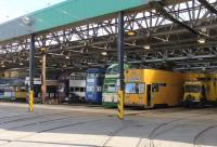 Although many old trams have left Blackpool in the last year or so a sizeable number are still kept at Rigby Road Depot. Here, from right to left, are engineering vehicle 754, restored Balloon 717, rebuilt Balloon 724, Balloon 700 in the new white and purple livery (having been modified to supplement the new Flexity cars on ordinary services) and two illuminated vehicles.<br><br>[Mark Bartlett 11/09/2012]