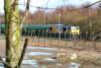 EWS 60063 stands at signals north of Fouldubs Junction in February 2008 with a trainload of tanks out of the Grangemouth refinery.<br><br>[John Furnevel 28/02/2008]