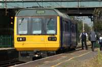 Northern 142060 calls at Leyland on 8 September 2012 with a service to Manchester Victoria.<br><br>[John McIntyre 08/09/2012]