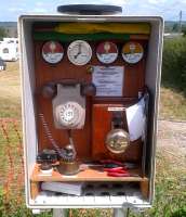 The small, but perfectly formed, signalling cabinet at the Common Lane level crossing [see image 39871] on the Gartell Light Railway (originally the Dorset Central Railway). Notice the handy tool kit at the bottom of the cabinet; the refreshments (a bottle of pop) are just out of shot.<br><br>[Ken Strachan 28/07/2012]