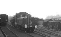 The RCTS/SLS <I>'Wansbeck Wanderer'</I> railtour photographed at Reedsmouth on 9 November 1963. Ivatt 2-6-0 no 43129 is in the process of running round its train at the Wansbeck Valley platform. [See image 36819]<br><br>[K A Gray 09/11/1963]
