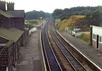 Delamere station is situated about six miles west of Northwich on the ex-CLC route from Manchester to Chester and today boasts a popular station cafe. That was, unfortunately, still way into the future on my brief visit in September 1972. A dmu can just be seen disappearing in the direction of Chester. <br><br>[Bill Jamieson 10/09/1972]