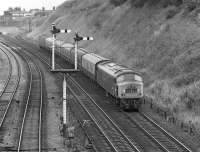 Just before three o'clock on a summer Saturday afternoon in 1975, Peak No. 45003 speeds south between Normanton station and Goose Hill Junction with the 14.43 Leeds - Plymouth.<br><br>[Bill Jamieson 19/07/1975]