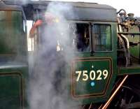 <I>'Right lads, kettle's boiled...'  </I> Fireman of 75029 'The Green Knight' at Whitby on 10 September 2012.<br><br>[John Steven 10/09/2012]