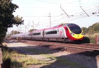 A southbound Virgin Pendolino speeds over Balshaw Lane Junction in September 2006.<br><br>[John McIntyre /09/2006]