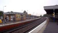 An intending passenger's view from the northbound platform at a wet and chilly Dunfermline Town station on 20 September 2012. Not a customer in sight...  probably sheltering from the weather. The passenger information display is inviting customers to attend the ScotRail 'Meet the Managers' Forum in Dalgety Bay on 25 September [see recent news item].<br><br>[Andrew Wilson 20/09/2012]