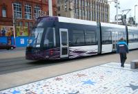 One of the Blackpool Flexity trams, no 003, passing Blackpool Tower in September 2012.<br><br>[Veronica Clibbery /09/2012]