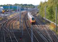 A Southbound Voyager passes Etterby on 23 September 2012, with the DRS depot on the left.<br><br>[John McIntyre 23/09/2012]