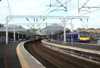 Looking towards the buffers at Helensburgh Central on the morning of 23 September 2012 with 334003 stabled in platform 1 and 320321+320301 in platform 3. <br><br>[John McIntyre 23/09/2012]