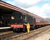 Class 08 D3605 [formerly 08490] removing the rear two coaches from a service train at Aviemore on 19 September.<br><br>[Peter Todd 19/09/2012]