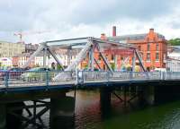 One of the Scherzer rolling lift bridges over a channel of the River Lee in Cork [see image 40504]. This was 'fixed' in the 1980s after the rail traffic ceased and the overhead control cabin, counterweight and mechanism were removed.<br><br>[Colin Miller 22/05/2008]