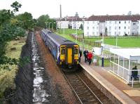 The 14.08 Glasgow Central - Paisley Canal service recently arrived at Hawkhead station on 28 Septmber 2012. Work on the electrification of the branch is now underway, with signs of preliminary activity evident here and at a number of other locations along the route.<br><br>[John Furnevel 28/09/2012]