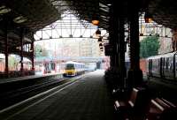 Inside looking out. The impressively refurbished Marylebone station in the summer of 2005, with a Chiltern Railways DMU running into the terminus on a service from Aylesbury.<br><br>[John Furnevel 23/07/2005]