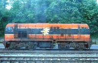 Small GM diesel Bo Bo No. 144 idles and enjoys a smoke in the up yard at Mallow, County Cork in May 2008. The container base no longer exists here [see image 19860].<br><br>[Colin Miller 21/05/2008]