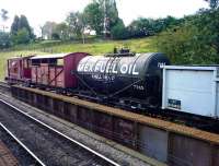 Miscellaneous goods vehicles in the siding at Goathland on 4 September.<br><br>[John Steven 04/09/2012]