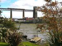 A class 170 heads into Fife over the Forth Bridge, seen from the approach road to North Queensferry (Old) station, on 3 October 2012.<br><br>[Bill Roberton 03/10/2012]