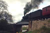 In the early summer of 1966, a Black 5 hauling a Carstairs train battles up the 1 in 102 gradient across the Union Canal near Kingsknowe.<br><br>[Frank Spaven Collection (Courtesy David Spaven) //1966]