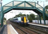 The 13.27 North Berwick - Edinburgh Waverley about to run into Prestonpans on 19 September 2012. The junction on the left is the line into Cockenzie power station.<br><br>[John Furnevel 19/09/2012]