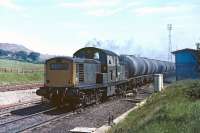 Clayton No. D8604 makes a smoky exit from the north end of Tyne Yard on 18 June 1970. The freight is an afternoon trip working formed of 45t oil tanks.<br><br>[Bill Jamieson 18/06/1970]