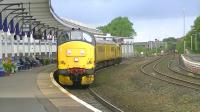 DRS class 37 no 37682 top and tailed with Network Rail's 97304 on 1Q14 radio test train from Carlisle to Derby RTC via Ayr, seen running through Kilmarnock station on 9 August 2012.<br><br>[Ken Browne 09/08/2012]