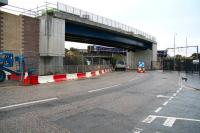 Roseburn Street, Edinburgh, on the morning of 14 October 2012, showing the bridge which will carry Edinburgh's trams. Beyond the new bridge a 158 potters around Haymarket depot sidings with the E&G main line running just beyond. The entrance to Murrayfield Stadium is to the right with the Murrayfield tram stop under construction off picture to the left.<br><br>[John Furnevel 14/10/2012]