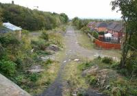 The Waverley trackbed running through the site of the proposed Newtongrange station on 13 October 2012. View is south from the A7 road bridge looking towards Gorebridge.  <br><br>[John Furnevel 13/10/2012]