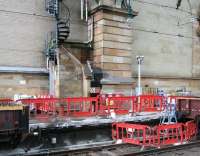 Platform edge renewal work in progress along platform 15 at Glasgow Central on 28 September. Note the high security access to the spiral staircase leading up to the station roof.<br><br>[John Furnevel 28/09/2012]