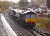 DRS 66424 about to run through Pitlochry station on 13 October with the 4D47 Inverness - Mossend Intermodal service.<br><br>[Bill Roberton 13/10/2012]