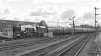 46233 <I>Duchess of Sutherland</I> drifts majestically into platform 6 at Stirling with 'The Caledonian' charter from Wolverhampton on 6 October 2012. The Pacific had taken over the train at Carlisle from class 86 electric locomotive no 86259.<br><br>[Bill Jamieson 06/10/2012]