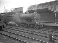 Platform 4 at Carlisle on 1 July 1961, with the 12.25pm from Hawick having just arrived behind 62484 <I>Glen Lyon</I>.<br><br>[K A Gray 01/07/1961]