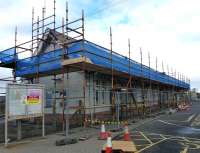 Roof repairs in progress at Prestwick Town station on 18 October 2012, with the building on the down platform receiving attention to slating.<br><br>[Colin Miller 18/10/2012]