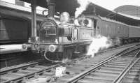 Smartly turned out J72 0-6-0T no 68736 on duty as a station pilot at Newcastle Central in the early 1960s.<br><br>[K A Gray //]