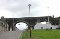 The old viaduct in Cullen, which crosses the main street in the town. [See image 38970] for the view in the opposite direction. <br><br>[Mark Bartlett 03/07/2012]
