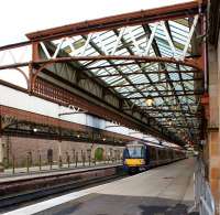 A Perth - Edinburgh service waits in Platform 5 at Perth on 13 October 2012.<br><br>[John McIntyre 13/10/2012]
