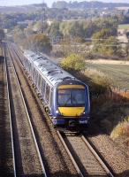 170404 and partner climb away from Inverkeithing East Junction towards Dalgety Bay with an Edinburgh - Aberdeen service on 21 October.<br><br>[Bill Roberton 21/10/2012]