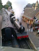 That classic over-the-bridge view beloved of small boys - so long as they can see over the parapet! Steam-hauled trains crossing at Arley during the Severn Valley Gala - which attracted passengers of all ages and both sexes in a rather pleasant party atmosphere.<br><br>[Ken Strachan 22/09/2012]