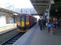 The 14.50 to Matlock, originating from Nottingham, stands alongside platform 1b at Derby station on 15 September 2012. I liked the old Derby station in my younger days, but have gradually come to appreciate the clean and airy feel of the 'new' station as I get older!<br><br>[Ken Strachan 15/09/2012]