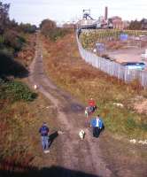 Looking north over the solum of the Borders Railway towards what is now the Scottish Mining Museum at Newtongrange on 9th October 2012. The museum will potentially be a significant generator of traffic for the railway, but the public path currently occupying the solum will - here and on other stretches - be diverted to less satisfactory on-road replacement routes.<br><br>[David Spaven 09/10/2012]