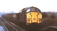 A Class 37 hauling coal hoppers approaching Newark Castle station in 1981.<br><br>[Ian Dinmore //1981]