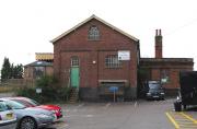 The Goods Shed at Thetford in October 2012. In reasonable condition with its attractive barge - boarded canopy still in place on the left hand side. As the sign says, the building is currently for sale.<br><br>[Brian Taylor 18/10/2012]